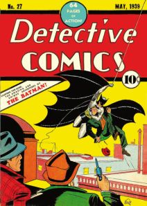 Portada del primer número de Batman (mayo 1939) - La imagen muestra la portada a todo color de la revista ilustrada Detective Comics en la que aparecen dos hombres vestidos con traje y sombrero de espaldas que miran asombrados como Batman les trae volando un delincuente. Pulse para ampliar.
